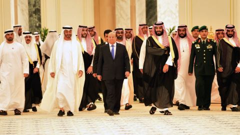 Yemeni President Abd-Rabbu Mansour Hadi is accompanied by Saudi Crown Prince Mohammed bin Salman Al Saud and Abu Dhabi Crown Prince Sheikh Mohammed bin Zayed Al Nahyan before signing an agreement in Riyadh, Saudi Arabia, in November 2019. 