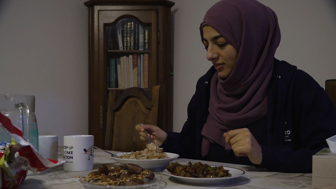 Hiba Latreche eating breakfast before beginning her fast during Ramadan.