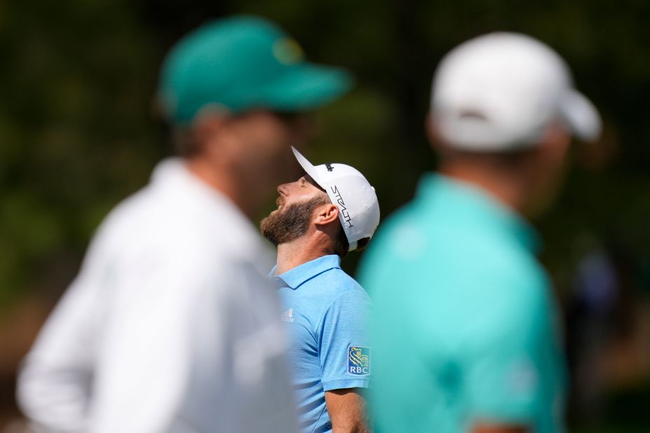 Dustin Johnson, the 2020 Masters champion, reacts to a missed putt on the seventh hole Friday.