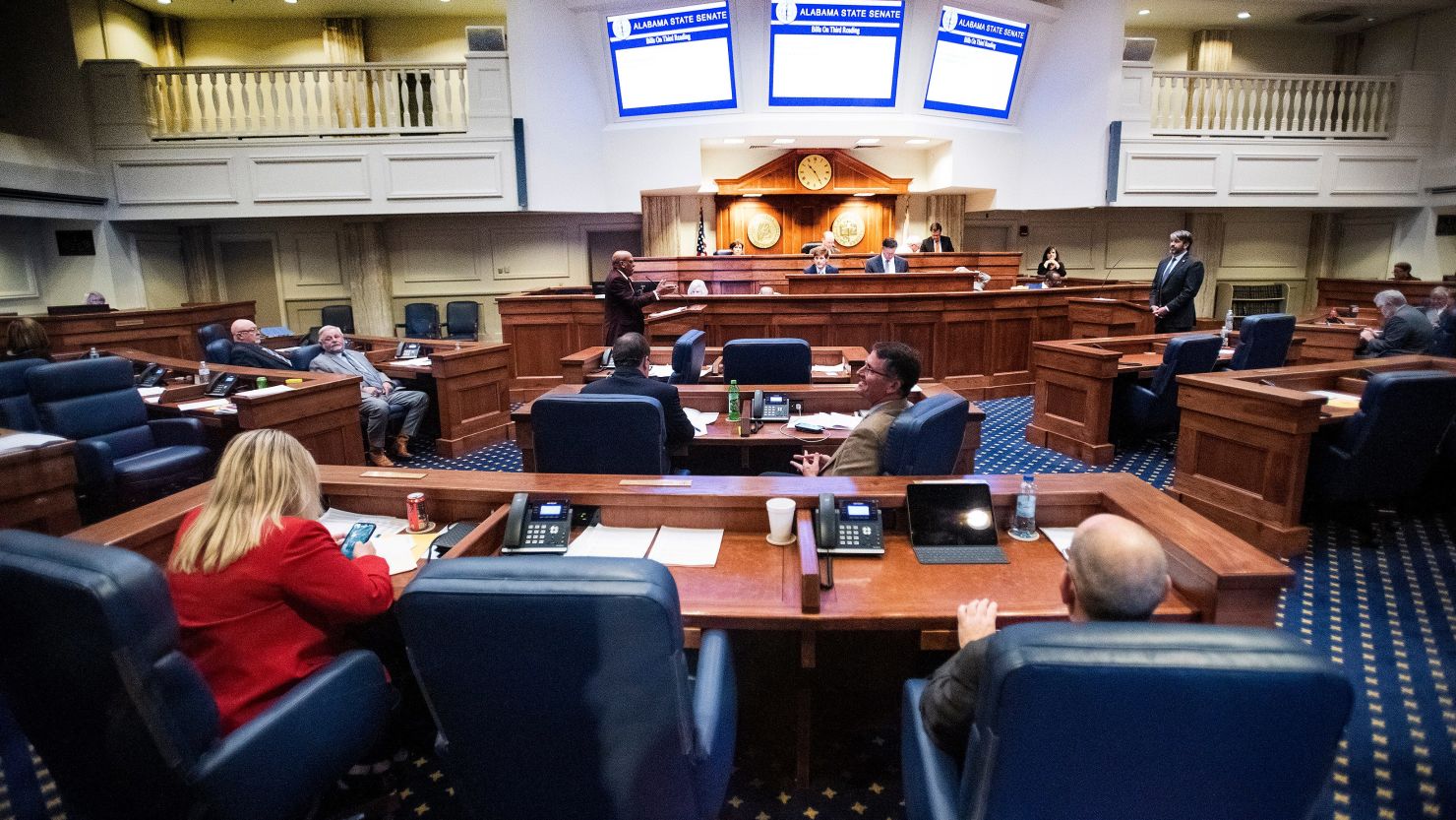 Sen. Shay Shelnutt, seated at center, listening to debate on transgender bills in the senate chamber at the Alabama Statehouse in Montgomery, Alabama, on Thursday April 7, 2022.