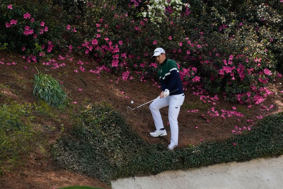 Keita Nakajima, the world's No. 1 amateur golfer, hits a shot after taking a drop on the 12th hole Friday.