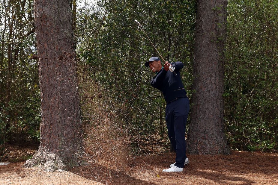 Woods plays a shot on the fifth hole on Friday. He had a rough start with four bogeys in his first five holes, but he recovered to finish with a 2-over-par 74.