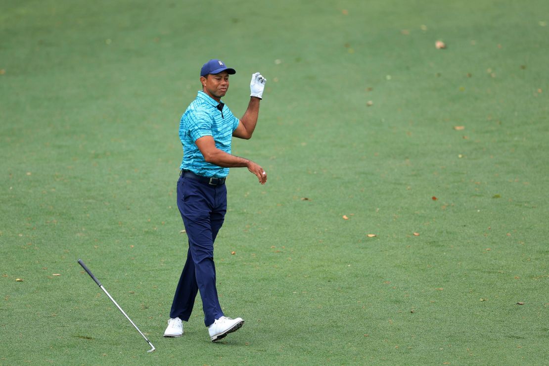 Woods reacts to his shot on the ninth hole during the second round of the Masters.