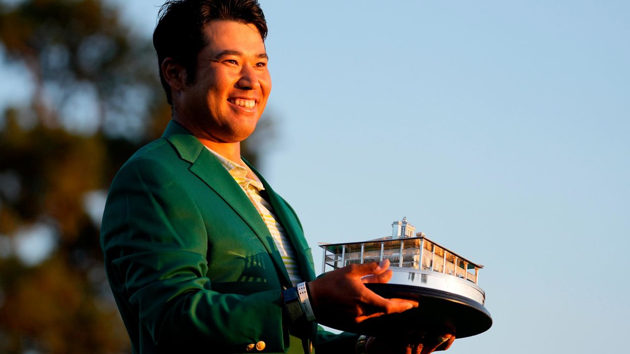Matsuyama holds the trophy after winning the Masters.