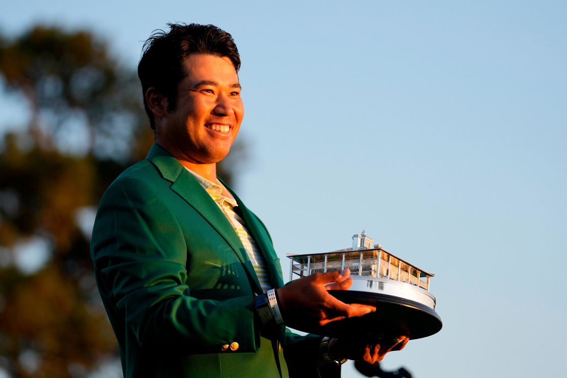 Matsuyama holds the trophy after winning the Masters.