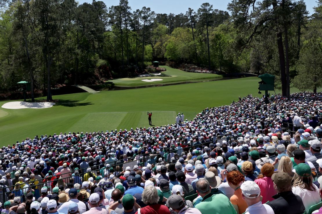 Woods plays his shot from the 12th tee during the final round of the Masters.