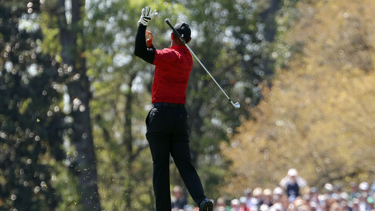 Woods reacts to his shot on the fifth hole during the final round of the Masters.
