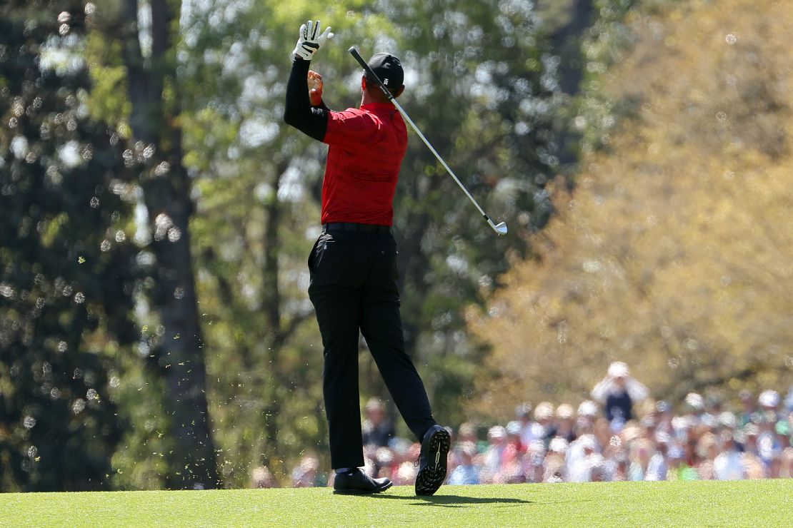 Woods reacts to his shot on the fifth hole during the final round of the Masters.