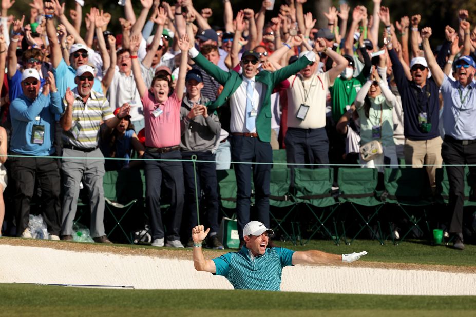 Rory McIlroy reacts after he sank a bunker shot for a birdie on the last hole Sunday.