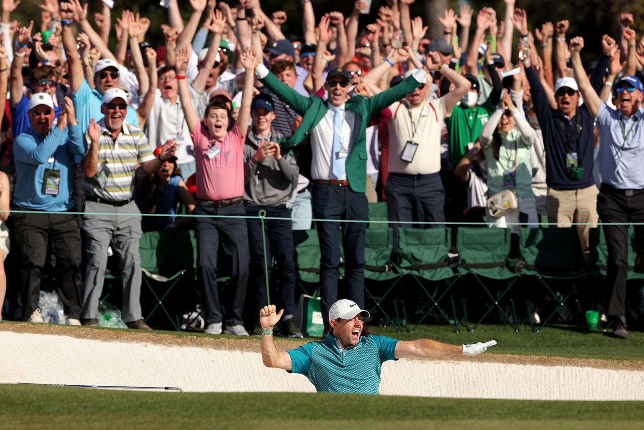Rory McIlroy reacts after he sank a bunker shot for a birdie on the last hole of the <a href="https://www.cnn.com/2022/04/07/golf/gallery/masters-golf-2022/index.html" target="_blank">Masters golf tournament</a> on Sunday, April 10. McIlroy finished in second place after shooting a final-round 64, one shot off the tournament record.