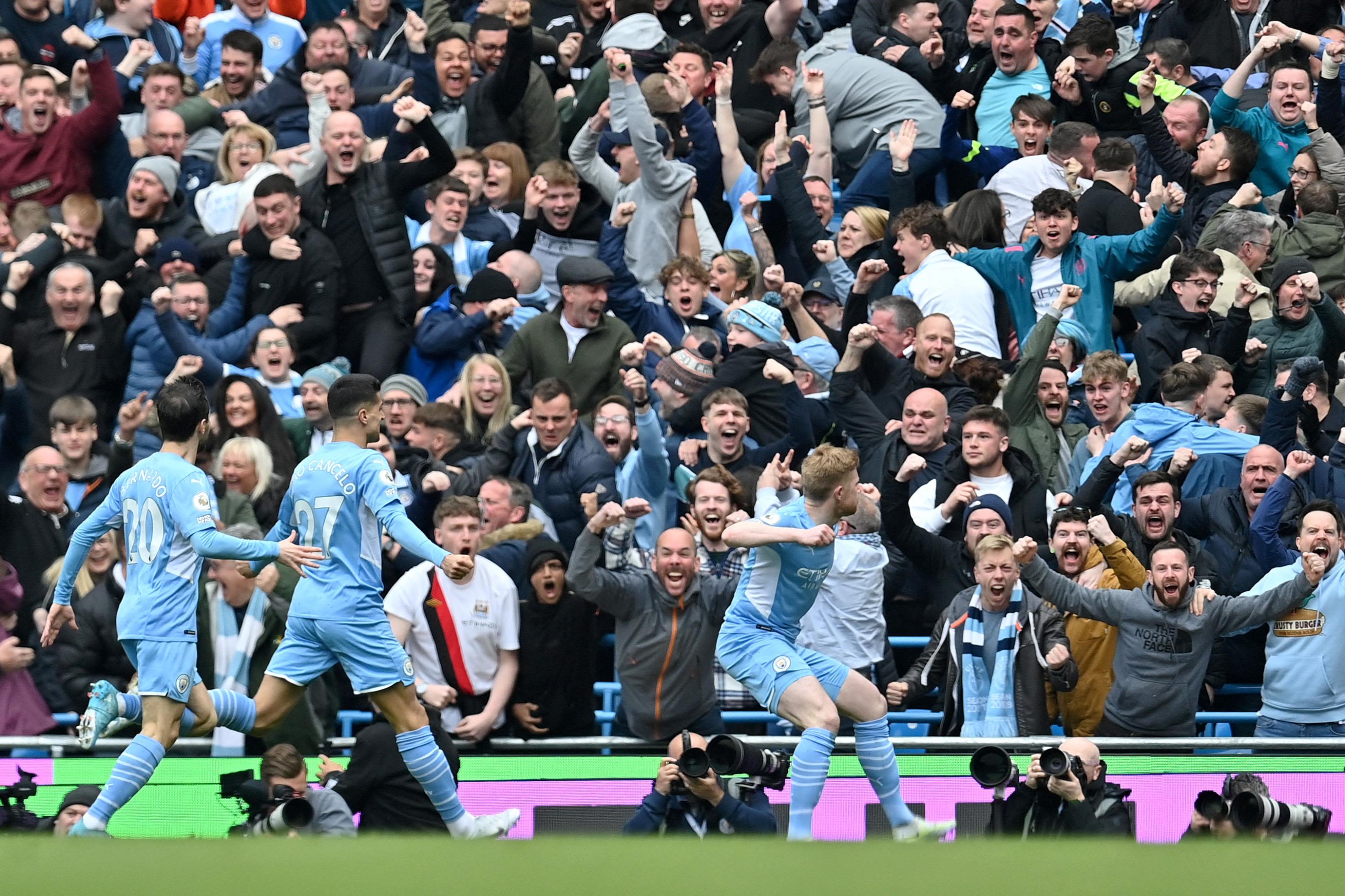 Manchester City ease to victory to keep Liverpool at bay in title race