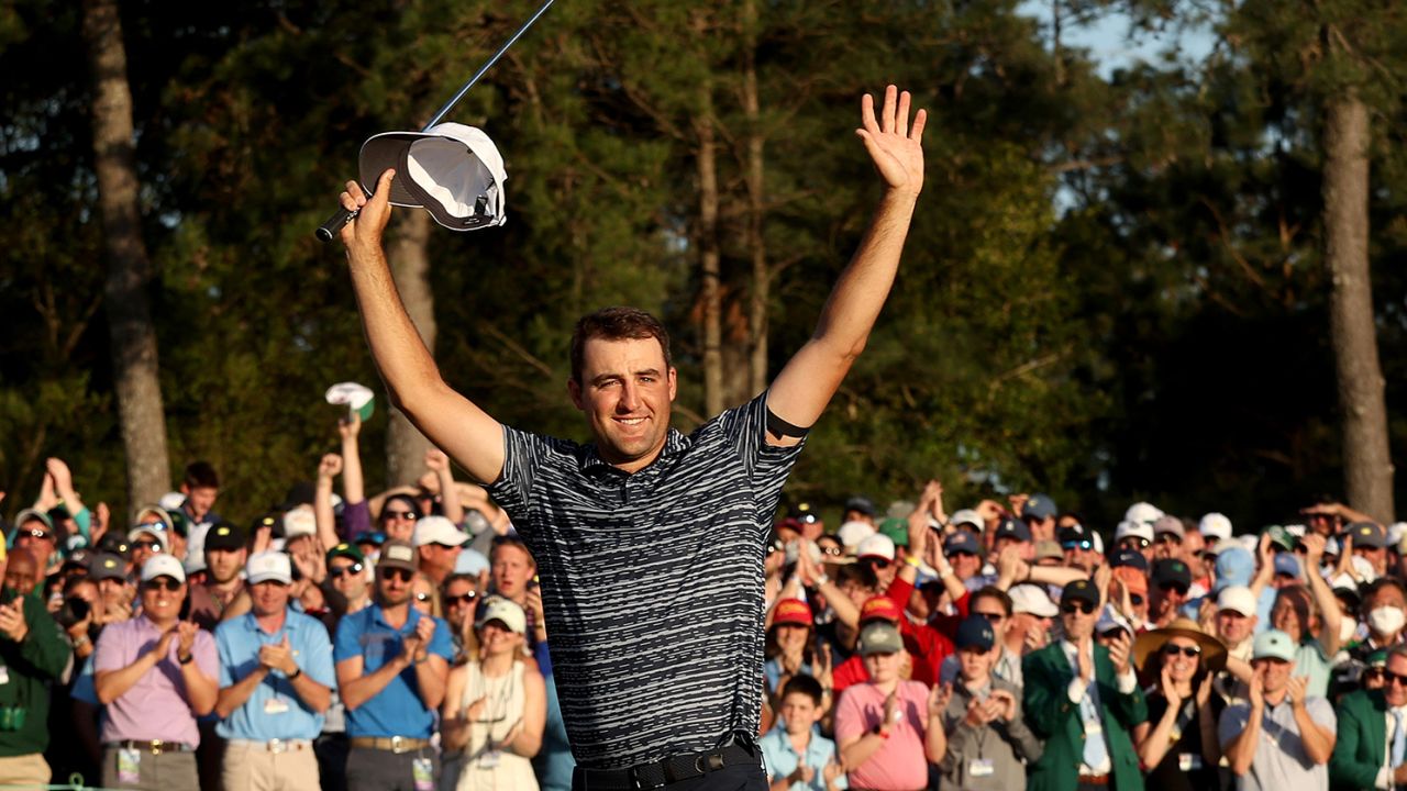 Scheffler celebrates on the 18th green after winning the 2022 Masters.