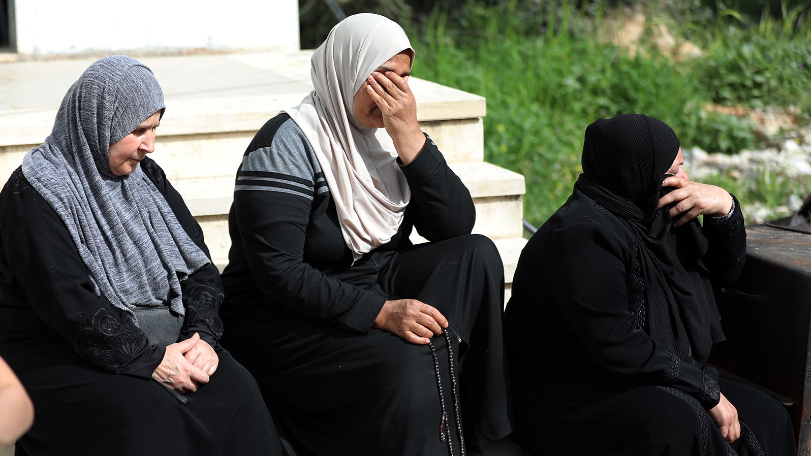 Relatives mourn during the funeral of Ghada Sbatin, who died after being shot by Israeli soldiers, in the West Bank village of Husan, on April 10.