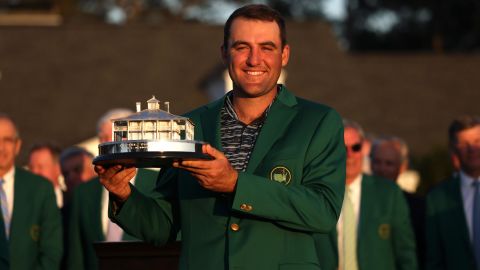 AUGUSTA, GEORGIA - APRIL 10: Scottie Scheffler poses with the Masters trophy during the Green Jacket Ceremony after winning the Masters at Augusta National Golf Club on April 10, 2022 in Augusta, Georgia. (Photo by Gregory Shamus/Getty Images)