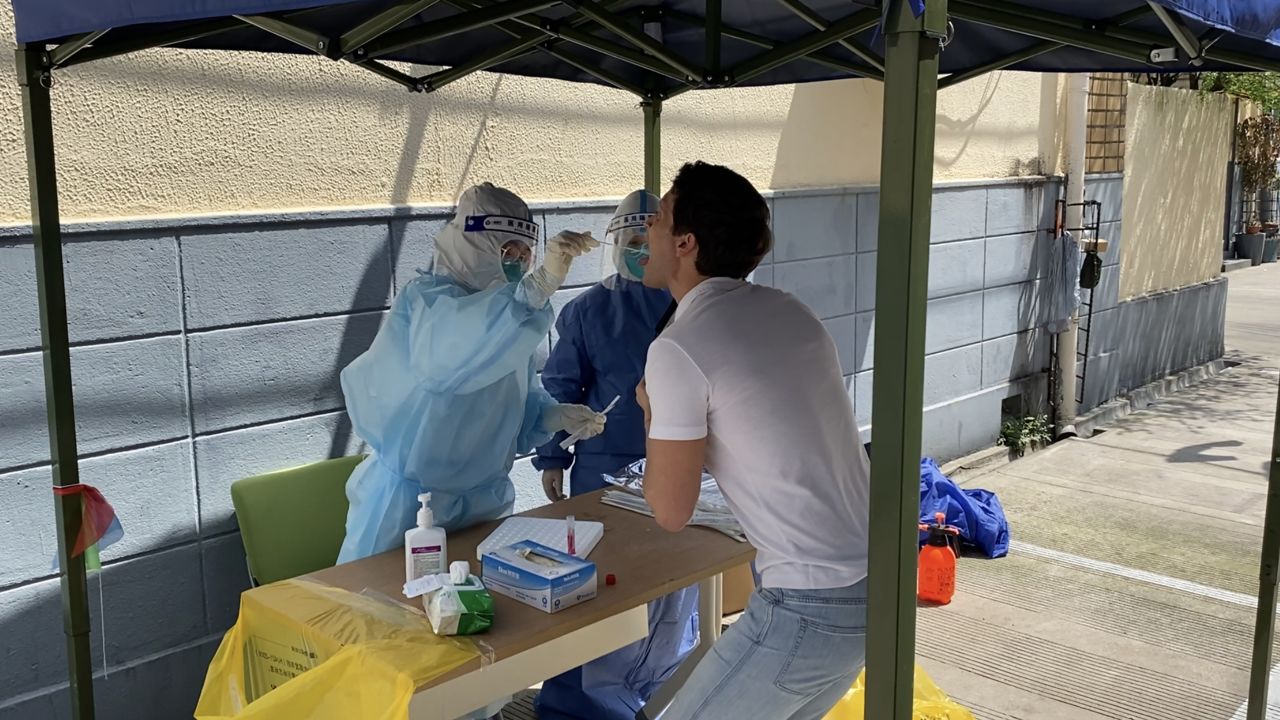 CNN's David Culver takes a regular Covid test during lockdown in Shanghai, China.