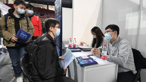 A student at a job fair at the Beijing Institute of Technology, Oct. 18, 2021.  