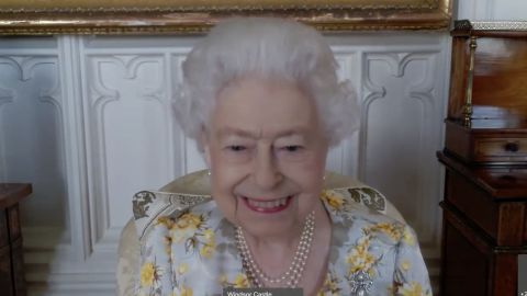 In this handout photo provided by Buckingham Palace, Queen Elizabeth II speaks to staff at the Royal London Hospital via video call on April 6, 2022.  