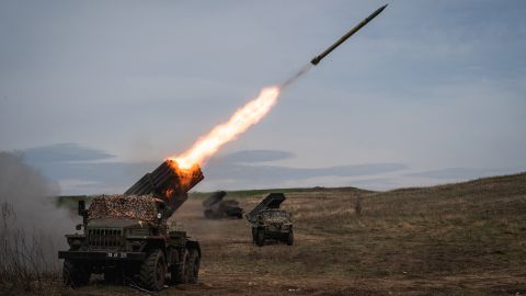 Ukrainian forces fire rockets toward Russian positions in Ukraine's Donbas region on April 10. <a href=