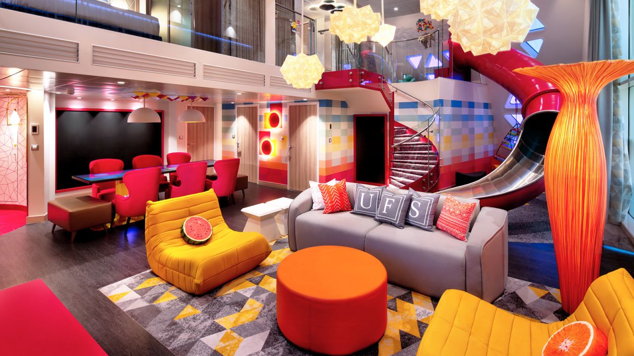 <strong>Royal Caribbean's Ultimate Family Suites: </strong>The suite is filled with vibrant colors and amenities like your own in-suite slide, an air hockey table and an 85-inch 4K TV. The suite can accommodate families of up to 10. 