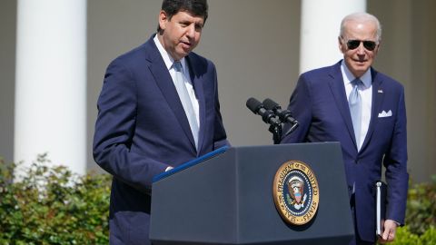 President Joe Biden listens as Steve Dettelbach, nominee for director of the Bureau of Alcohol, Tobacco, Firearms and Explosives, speaks on measures to combat gun crime from the Rose Garden of the White House, on April 11, 2022.