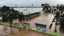 An aerial photo shows a school building submerged by flood waters in Abuyog town, Leyte province, southern Philippines, on April 11, 2022, following heavy rains brought about by tropical storm Agaton. 