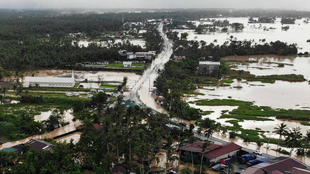 A highway and houses submerged by flood waters in Abuyog town, Leyte province, southern Philippines, on April 11, following heavy rains brought about by tropical storm Megi. 