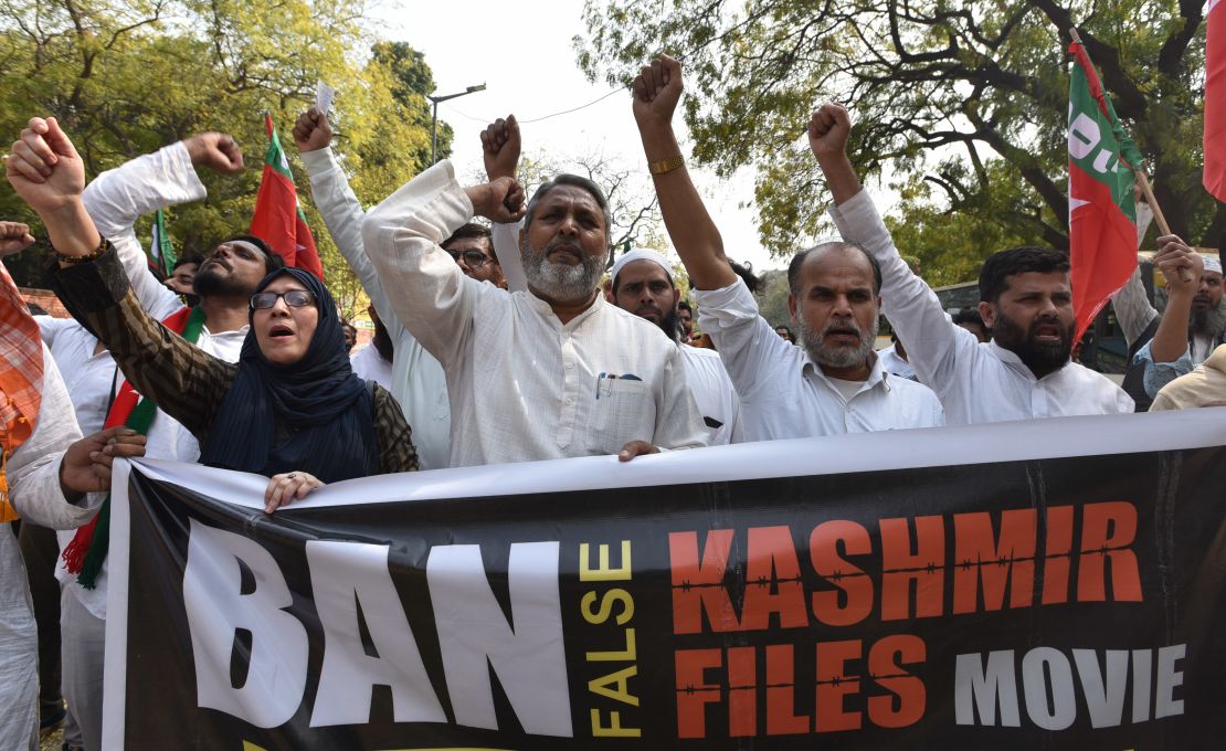 Members of the Social Democratic Party of India call to ban "The Kashmir Files" from screening in cinemas.