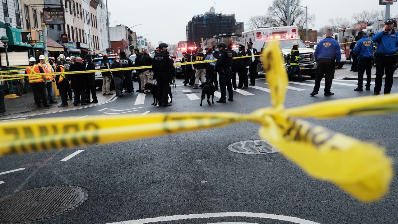 NEW YORK, NEW YORK - APRIL 12: Police and emergency responders gather at the site of a reported shooting of multiple people outside of the 36 St subway station on April 12, 2022 in the Brooklyn borough of New York City. According to authorities, multiple people have reportedly been shot and several undetonated devices were discovered at the 36th Street and Fourth Avenue station in the Sunset Park neighborhood.  (Photo by Spencer Platt/Getty Images)