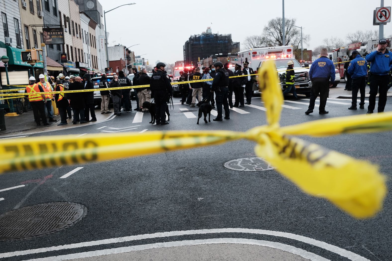 Emergency responders gather at the site of the shooting.