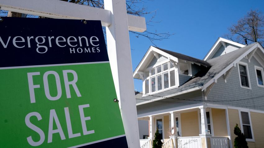 A For Sale sign is displayed in Falls Church, Virginia, on April 2, 2022. 