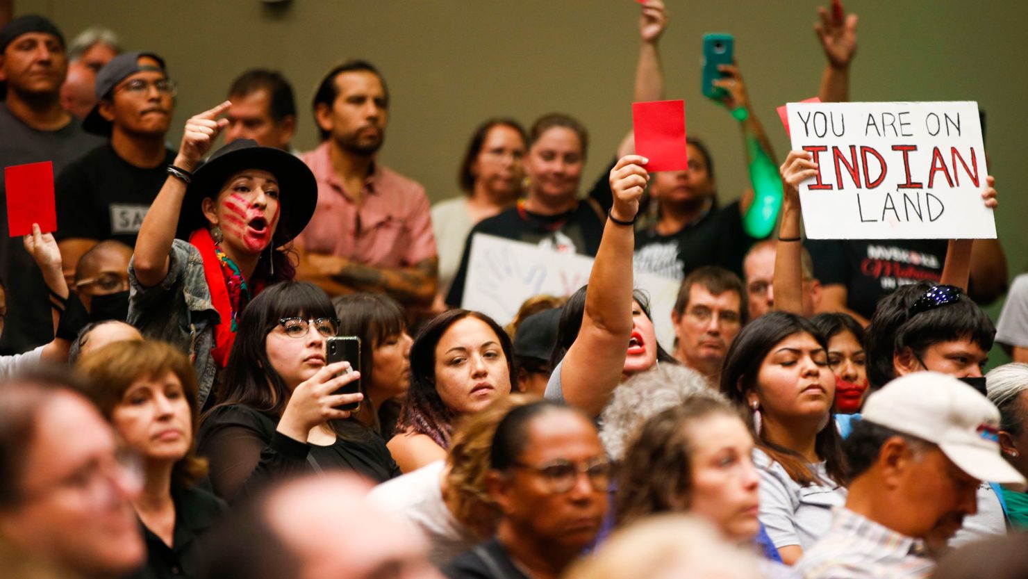 In McGirt v. Oklahoma, the US Supreme Court found that the Muscogee (Creek) Nation had remained a reservation after Oklahoma became a state. Here, protesters counter claims heard during a panel to address the post-McGirt landscape.