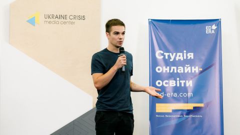 Ilia Filipov, cofounder and CEO of EdEra, an online education platform. The brand banner next to him reads "online education studio, ed-era.com'."
