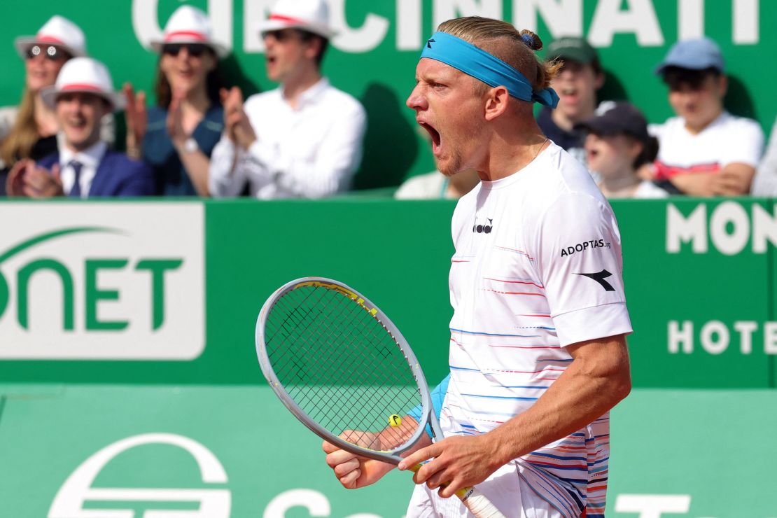 Davidovich Fokina celebrates against Djokovic.