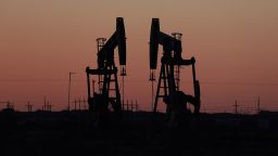 Oil pumpjacks work in the Permian Basin oil field on March 11, 2022 in Midland, Texas.