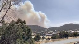 Laura Reynolds lives in the Rancho Ruidoso Valley Estate subdivision in Alto, New Mexico. She recorded a video showing the smoke from the fire looming over her neighborhood. While she was talking to CNN, police gave orders for her to evacaute. 