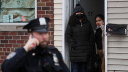 People look out at the scene of a shooting at a subway station in the Brooklyn borough of New York City, New York, U.S., April 12, 2022.