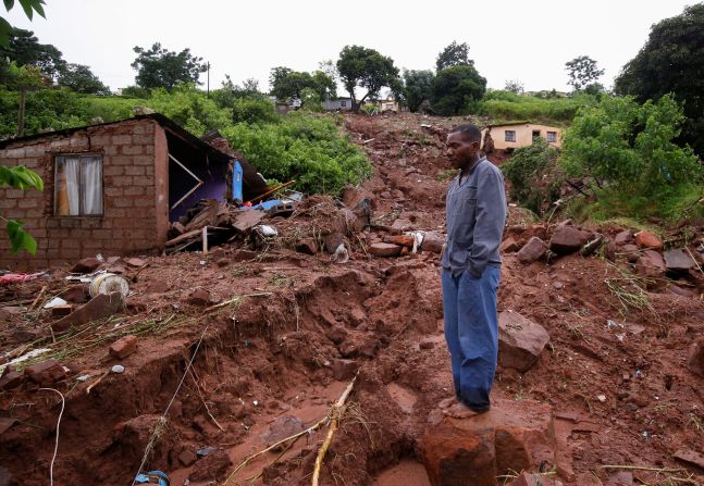 Jomba Phiri walks over to where his house once stood in Durban.