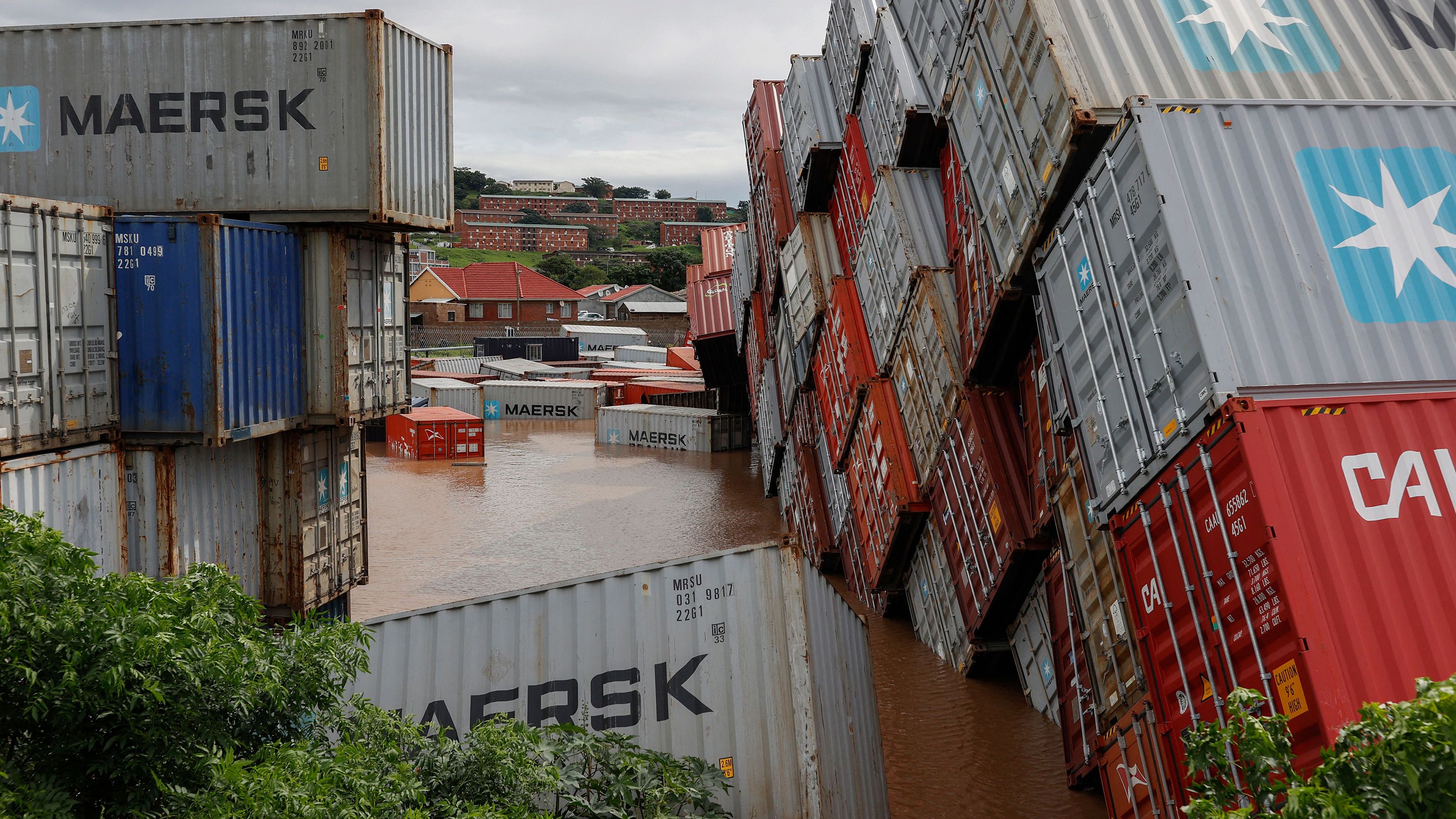 A general view of containers that fell over at a container storage facility following heavy rains, winds and floods in Durban on April 12, 2022. 