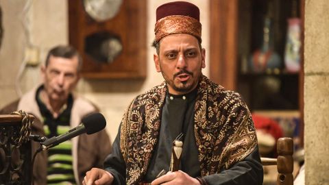 A traditional "hakawati" story-teller performs late after midnight during the Muslim holy fasting month of Ramadan, at the historic Dar Halabia hotel (restored after damage during the Syrian conflict) in the Bab Antakya (Antioch Gate) area of the old city of Syria's northern Aleppo, on April 12.