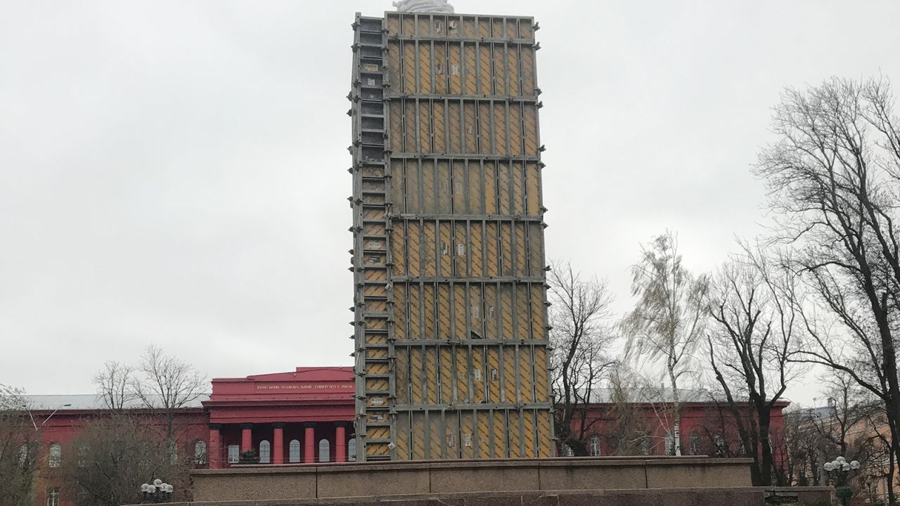 A statue of Ukrainian poet Taras Shevchenko shrouded in protective scaffolding, in Kyiv on April 13.