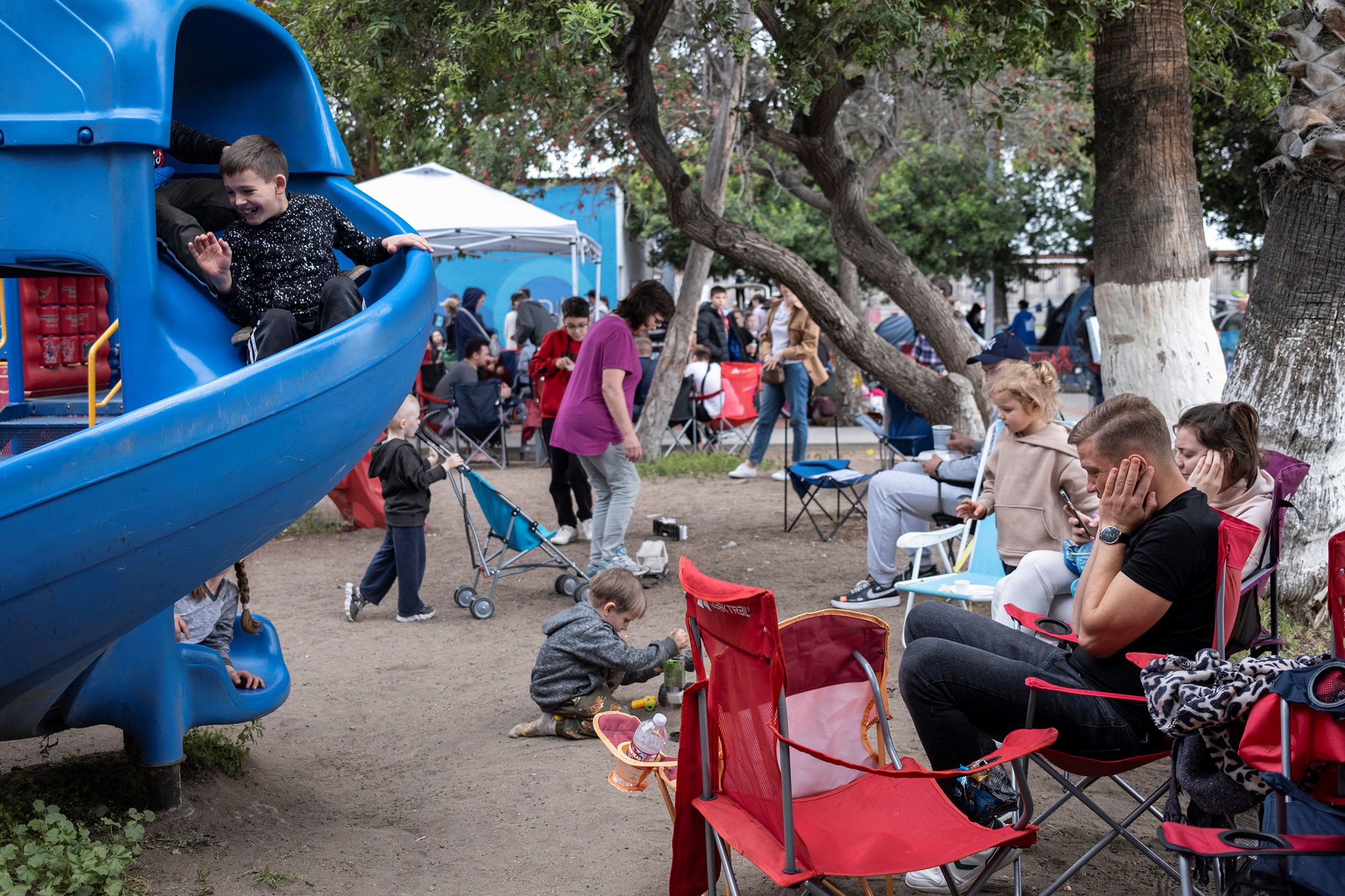 As the number of Ukrainians in Tijuana increased, the city opened a sports complex as a temporary shelter. Here children play at the facility on April 10 while their families wait.