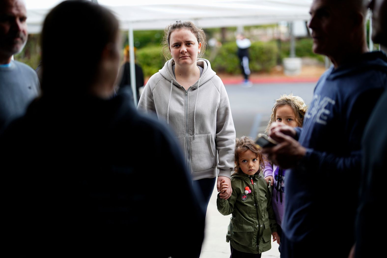 A Ukrainian family arrives at Calvary San Diego on April 1. The church has been providing shelter for many Ukrainians after they make it across the border.