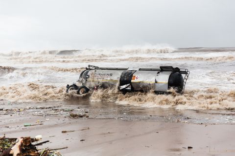 Waves hit a damaged fuel tanker at the Blue Lagoon beach in Durban on April 12.