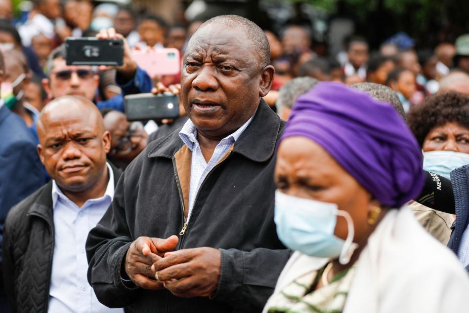 South African President Cyril Ramaphosa, center, visits Clermont on April 13. He spoke to various people grieving at the United Methodist Church of South Africa.
