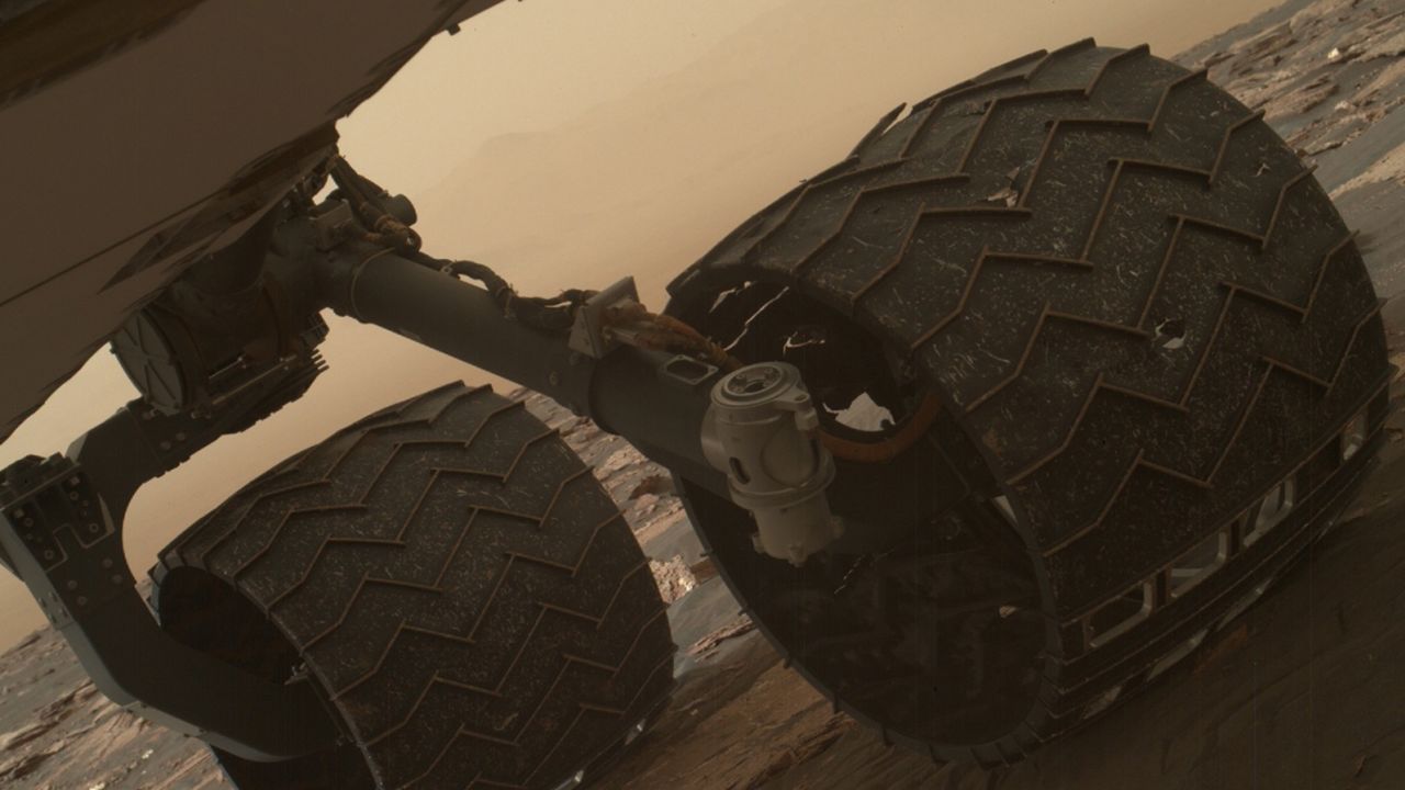 Ventifacts previously caused some damage to the rover's wheels, as seen in this photo from March 2017.