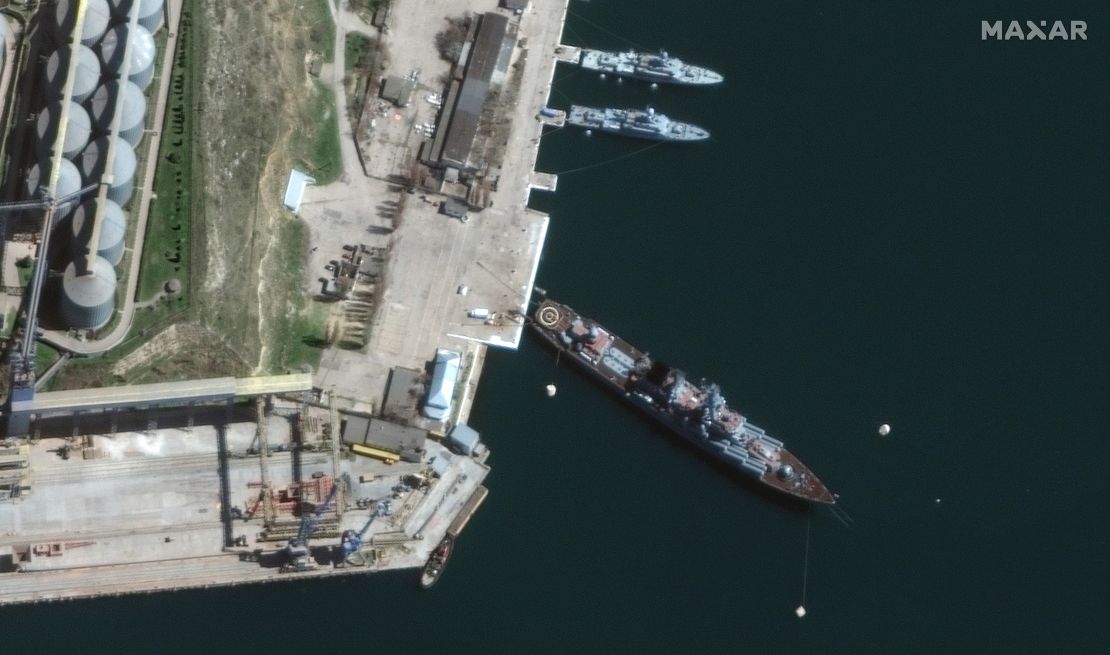 The Russian Navy cruiser Moskva, bottom, is seen in port in Sevastopol, Crimea, on April 7.