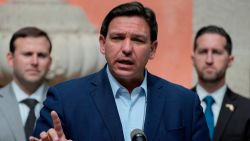 FILE - Florida Gov. Ron DeSantis speaks during a news conference, Feb. 1, 2022, in Miami. Gov. DeSantis has signed a COVID-19-linked bill requiring health care centers to allow in-person visitations, as the Republican announced he approved dozens of other measures passed during this year's legislative session. (AP Photo/Rebecca Blackwell, file)