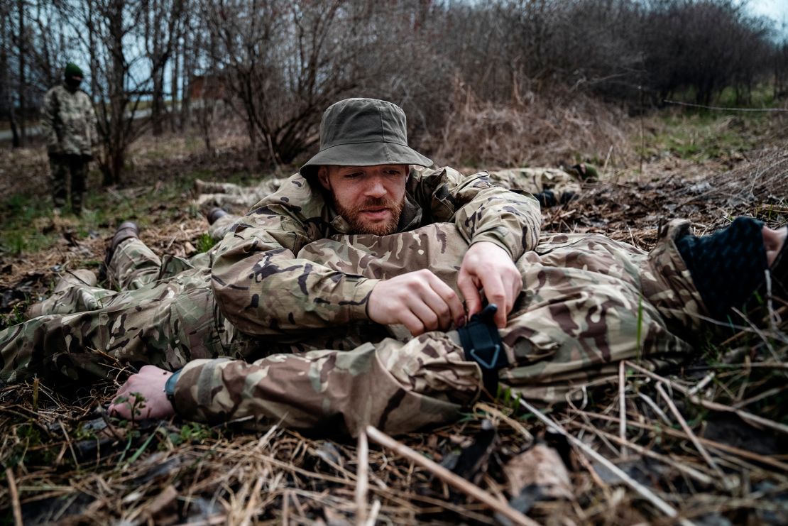 A group of Belarusian dissidents are taught basic survival training skills at the Poland-Ukraine border. The aspiring volunteer fighters want to join the fight for Ukraine.