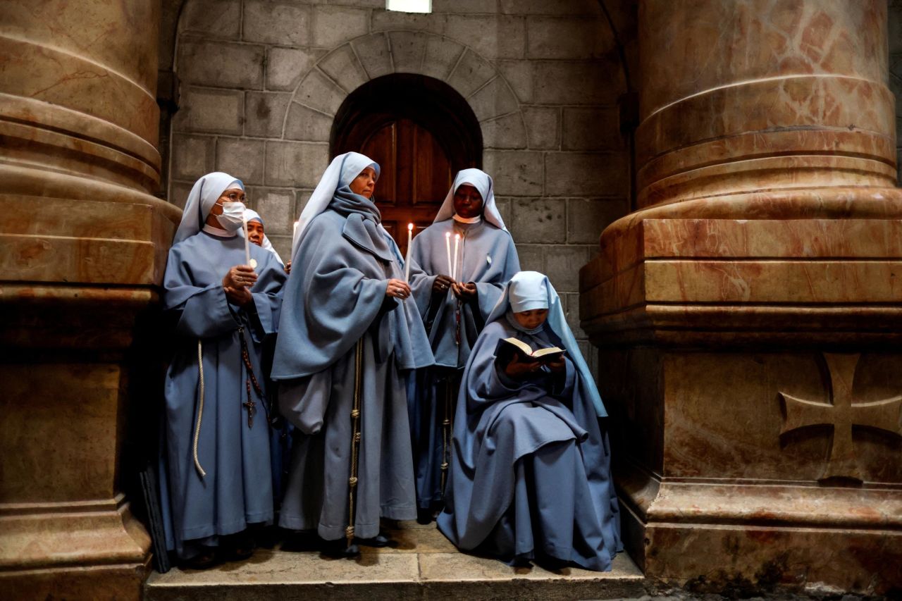 Nuns in Jerusalem's Old City take part in an Easter Holy Week ceremony at the Church of the Holy Sepulchre on Thursday, April 14.