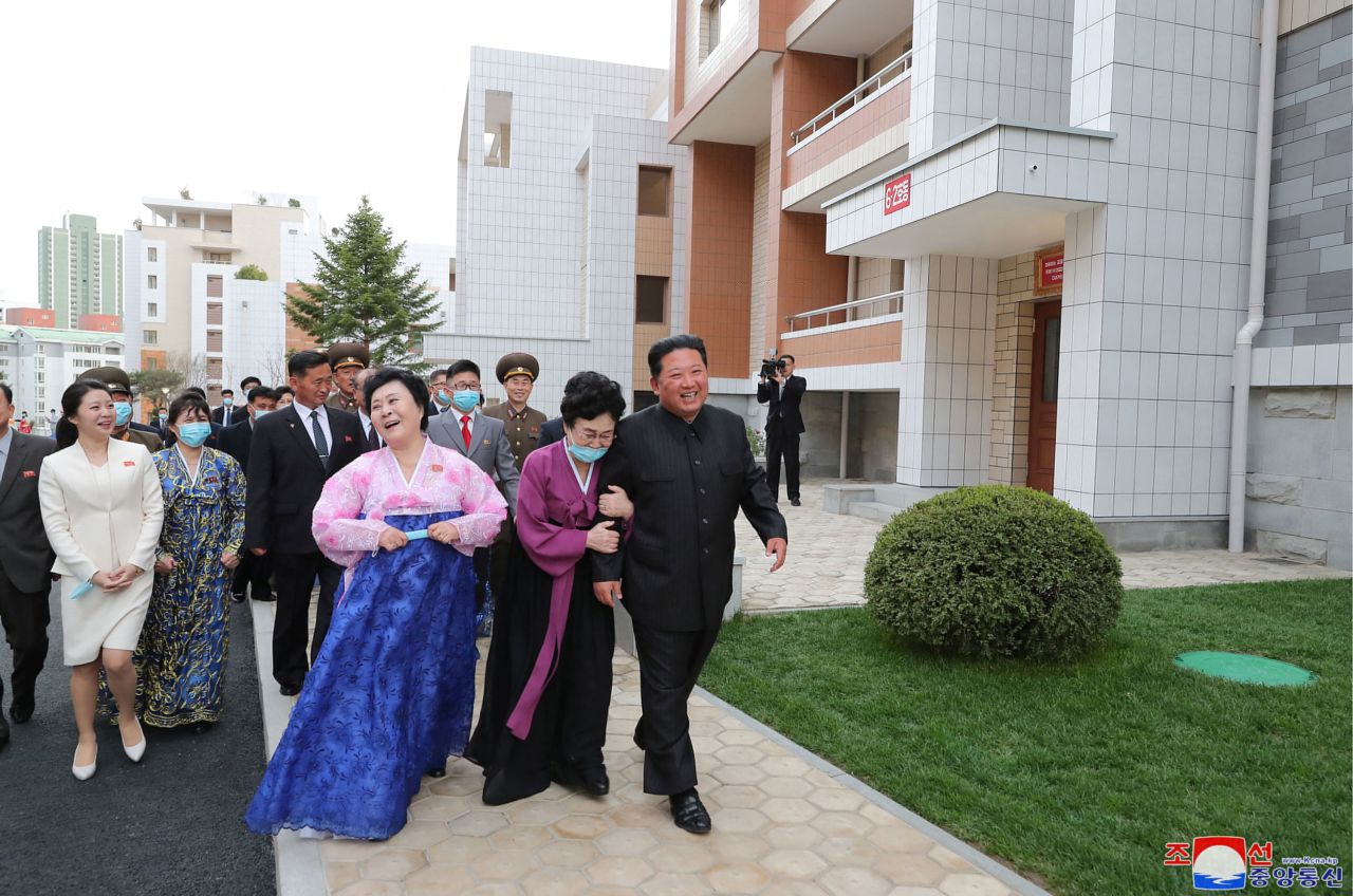 In this photo released by North Korea's state-run news agency, North Korean leader Kim Jong Un visits a residential district during its completion ceremony in Pyongyang, North Korea, on Wednesday, April 13.